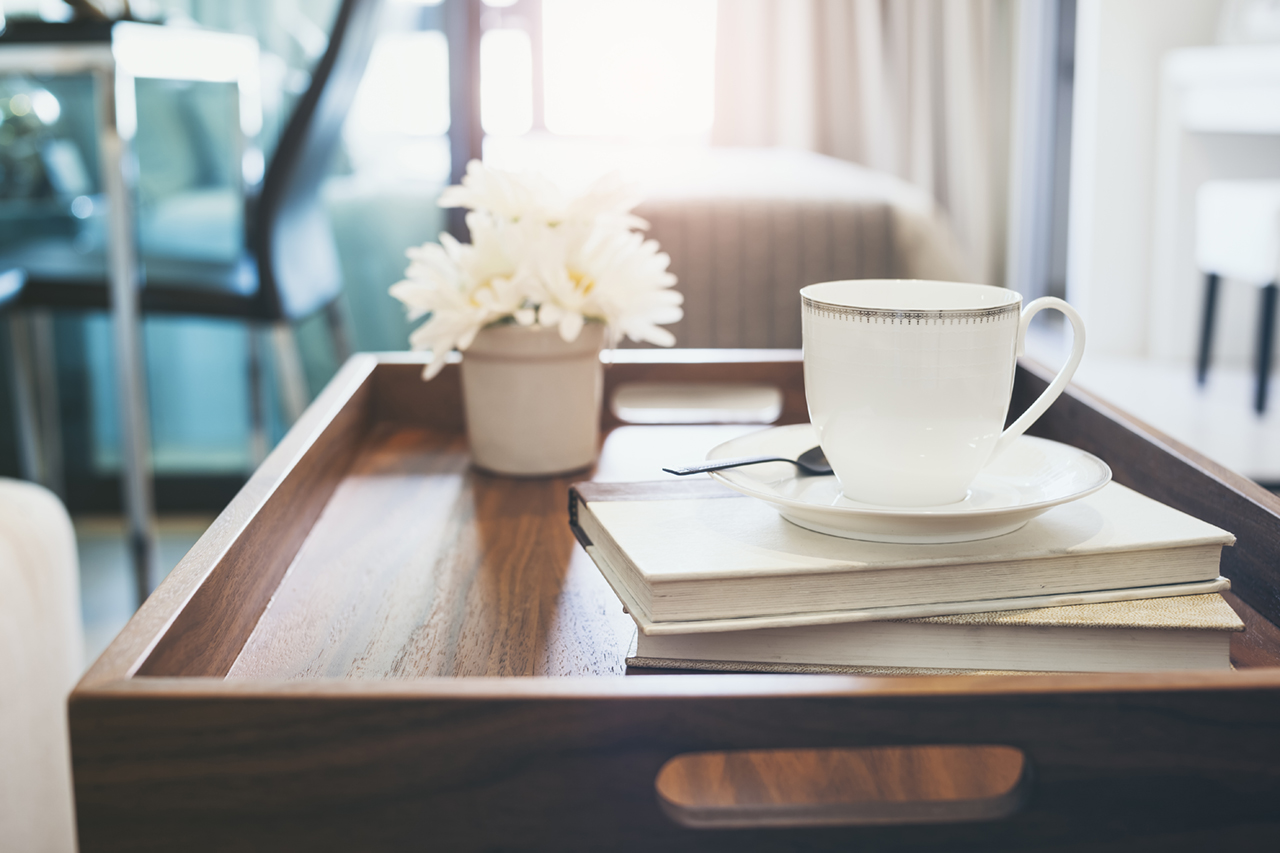 Coffee-cup-Book-white-flower-on-wooden-tray-Interior-decoration at Stadium Square Apartments